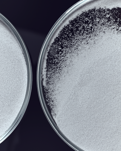 dieux Dieux-two-round-containers-filled-with-white-powder-1.