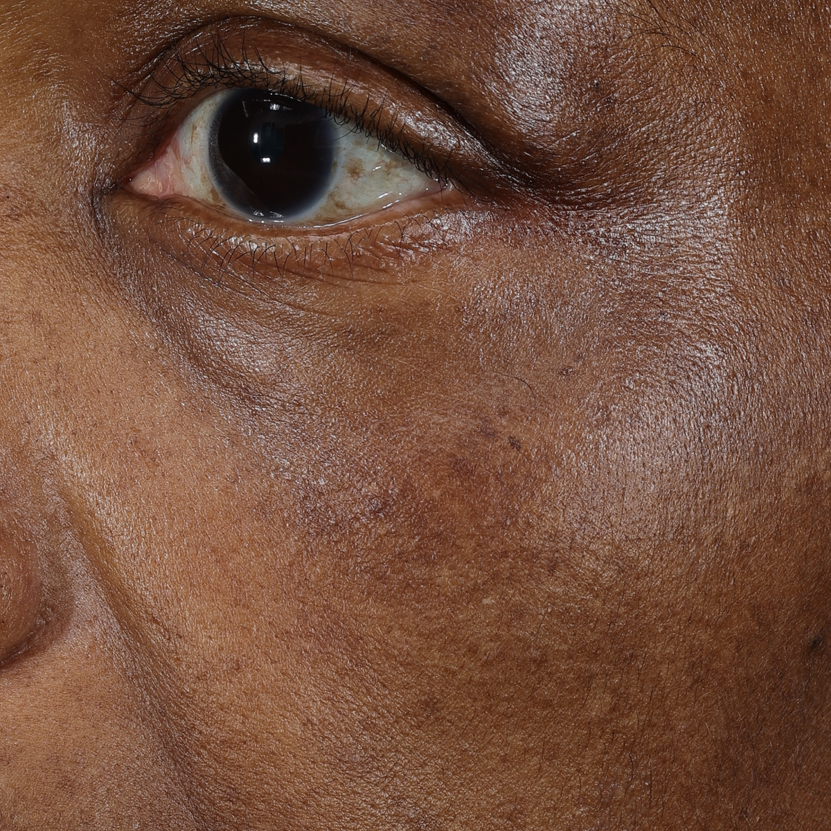 dieux Dieux-close-up-of-the-eye-area-on-a-person-with-dark-skin.